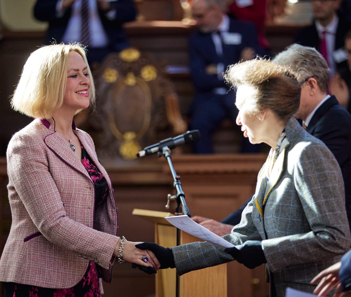 Rowan Mackenzie receives an award from Princess Anne