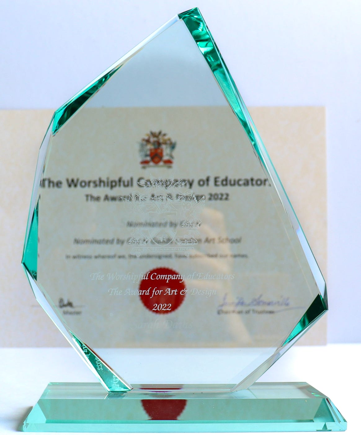 the trophy and certificate that Educatprs Trust awards receive at an awards dinner along  with their cheque.